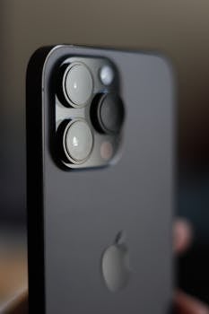 Detailed close-up shot of a smartphone camera showcasing advanced lenses.