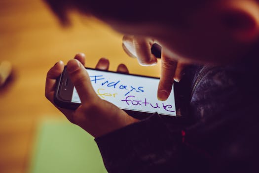 A close-up of a child using a smartphone, highlighting a 'Fridays for Future' message, symbolizing youthful involvement in climate activism.