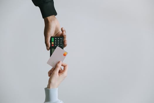 Modern contactless payment using a card and terminal, highlighting the ease of digital transactions.