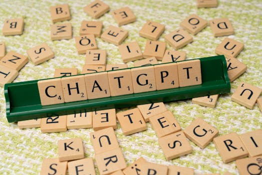 Scrabble game spelling 'CHATGPT' with wooden tiles on textured background.